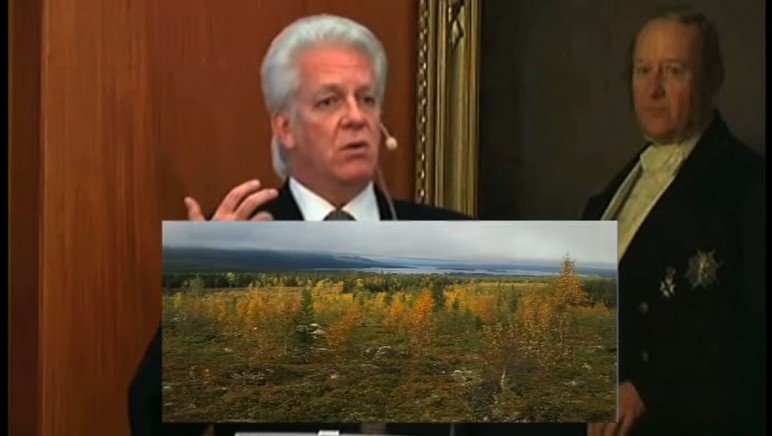 Clive Sinclair-Poulton, stjórnarformaður Beowulf, á fundi með fjárfestum árið 2014. Hvaða íbúar spurði hann og sýndi fjárfestunum mynd af skóginum þar sem náman er áformuð.