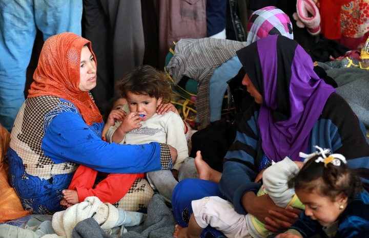 Konur á flótta í Mósúl í Írak.