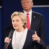 Það þótti skrýtið þegar Donald Trump elti Hillary Clinton um sviðið í öðrum kappræðum þeirra í fyrra. Clinton lýsir tilfinningum sínum í nýrri bók.