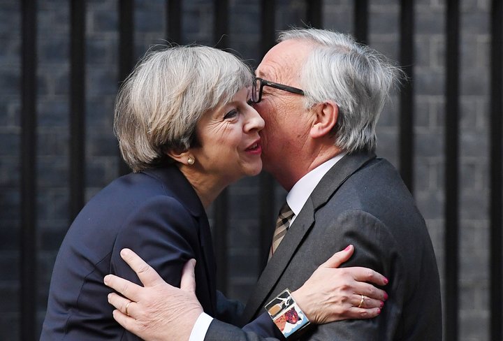 theresa may, jean claude juncker