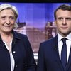 Marine Le Pen og Emmanuel Macron eru í forsetakjöri. Þau tókust á í sjónvarpskappræðum í gærkvöldi.