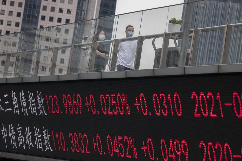 Lækkun hefur orðið á hlutabréfamörkuðum í Kína vegna orkuskortsins. Mynd: EPA