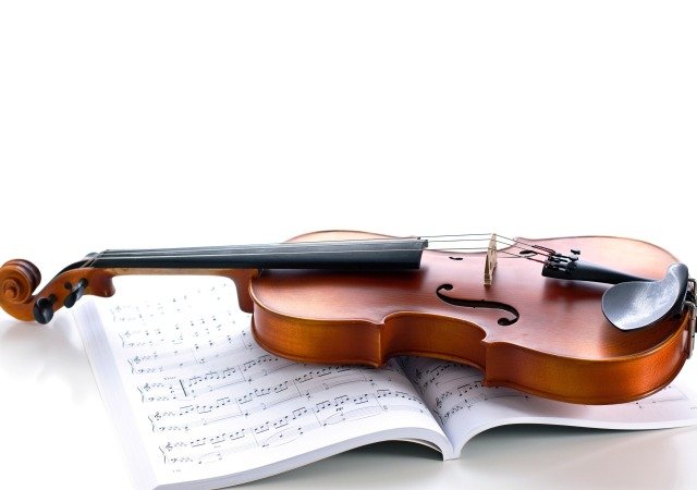 violin.strings.musical.instruments.sheet-.music-.magazine.white-.background.jpg